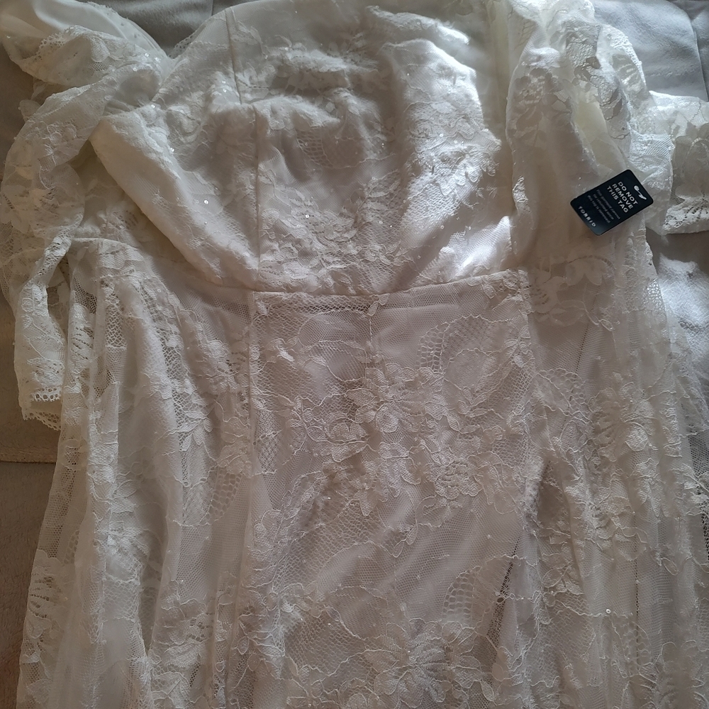 Ivory Torrid wedding dress size 18 new with tags